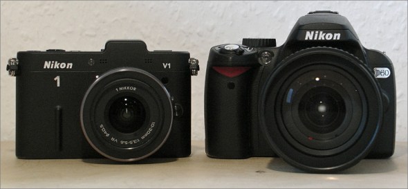 Nikon_1_V1_versus_Nikon_D60_Front